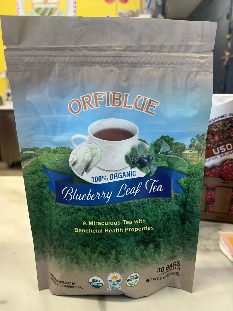 A package of Dr. Schulze's Teas, with a tea cup, blueberries, leaves, and certification logos on the front; perfect for organic and vegan lifestyles.